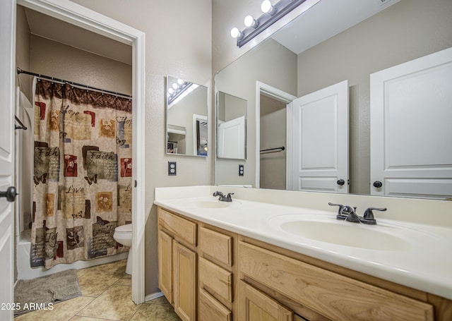 6811 W Darrel Rd, Laveen, AZ 85339 - bathroom with double vanity, tile patterned floors, toilet, and a sink