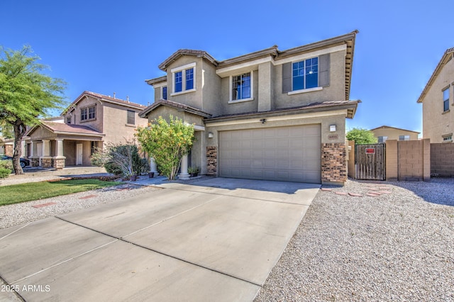 6811 W Darrel Rd, Laveen, AZ 85339 - view of front of house featuring a gate, a garage, stucco siding, fence, and driveway