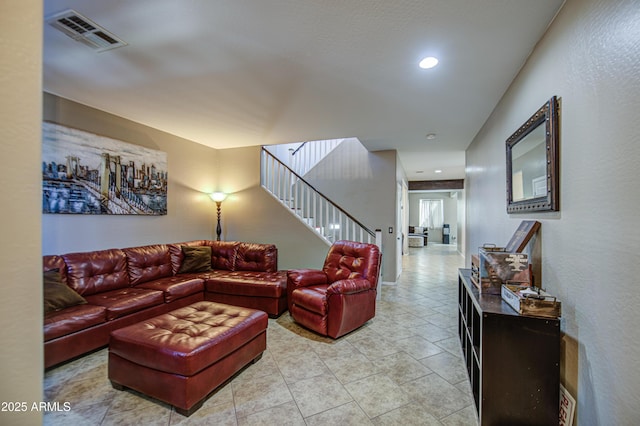 6811 W Darrel Rd, Laveen, AZ 85339 - living room featuring light tile patterned floors, stairs, recessed lighting, and visible vents