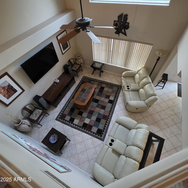 1032 E Sheffield Ave, Chandler, AZ 85225 - living room featuring tile patterned floors, a ceiling fan, and a high ceiling
