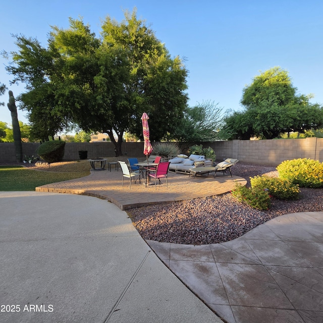 1032 E Sheffield Ave, Chandler, AZ 85225 - fenced backyard featuring a patio area and an outdoor living space