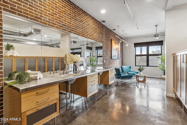 interior space featuring ceiling fan