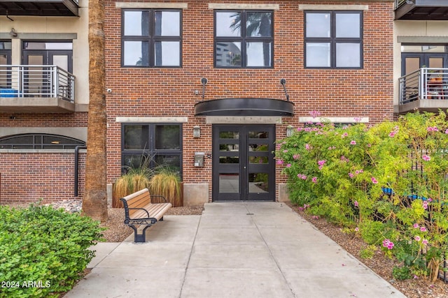 property entrance featuring french doors