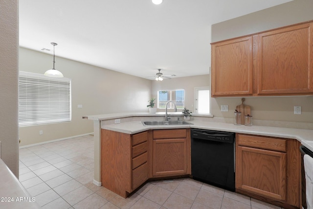 kitchen with kitchen peninsula, sink, decorative light fixtures, black dishwasher, and light tile patterned flooring