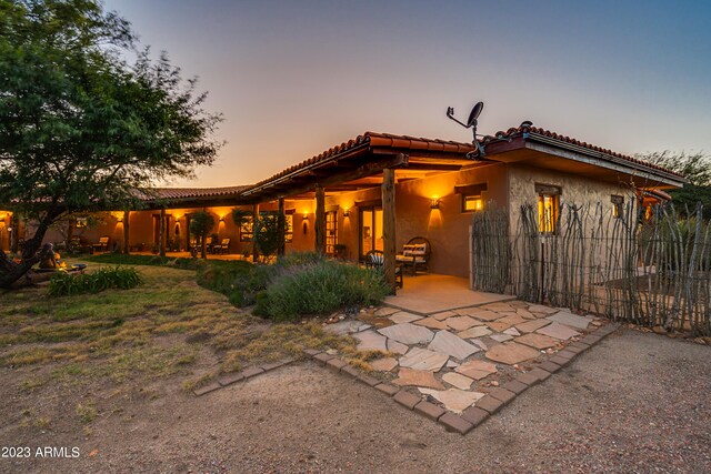 view of front facade featuring a patio area