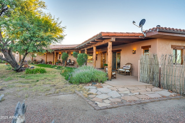 view of front of house with a patio