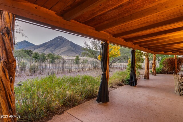 view of terrace with a mountain view