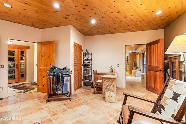 office featuring wooden ceiling and light tile flooring