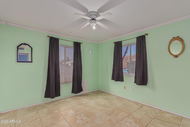 unfurnished room featuring ornamental molding, light tile patterned floors, and ceiling fan