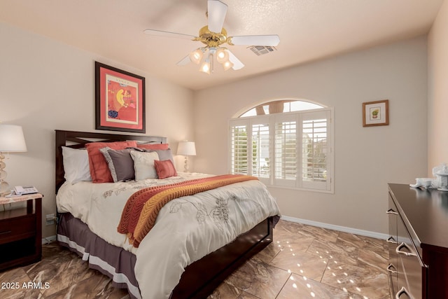 bedroom featuring ceiling fan