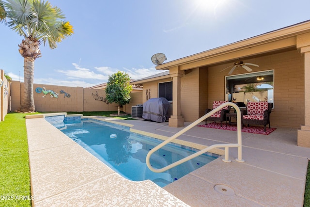 view of swimming pool featuring grilling area, a patio, cooling unit, and ceiling fan