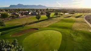 surrounding community with a mountain view