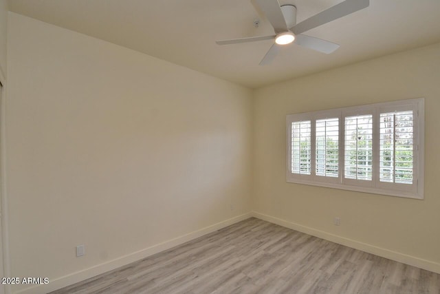 unfurnished room featuring ceiling fan and light hardwood / wood-style floors