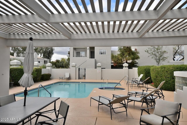 view of swimming pool with a pergola and a community hot tub