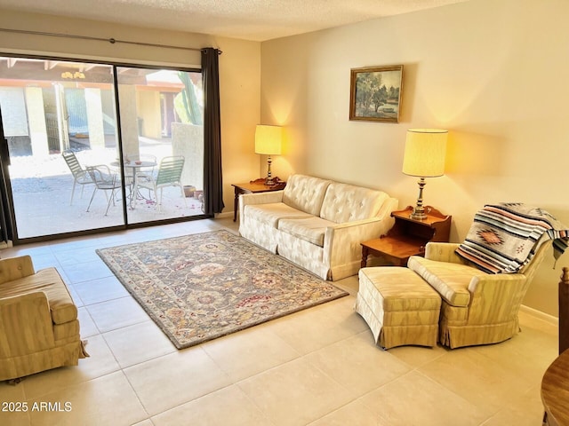 tiled living room with a textured ceiling