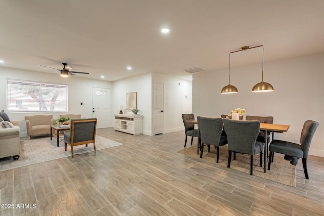 dining room with ceiling fan, recessed lighting, baseboards, and wood finish floors