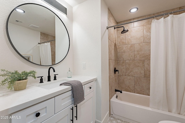 full bath with vanity, recessed lighting, shower / bath combo, and visible vents