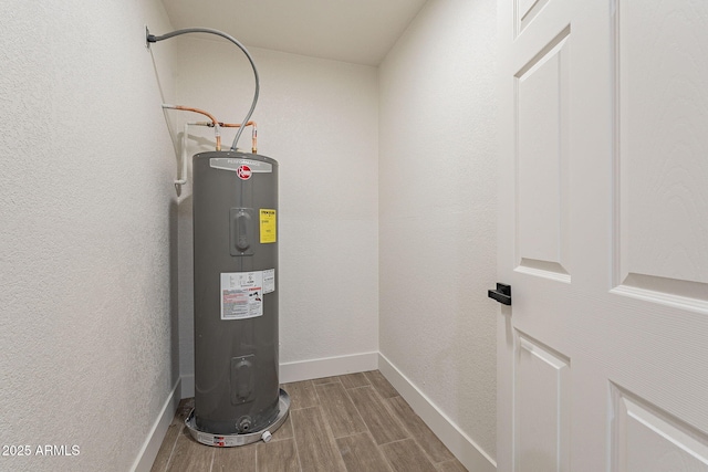 utility room with electric water heater