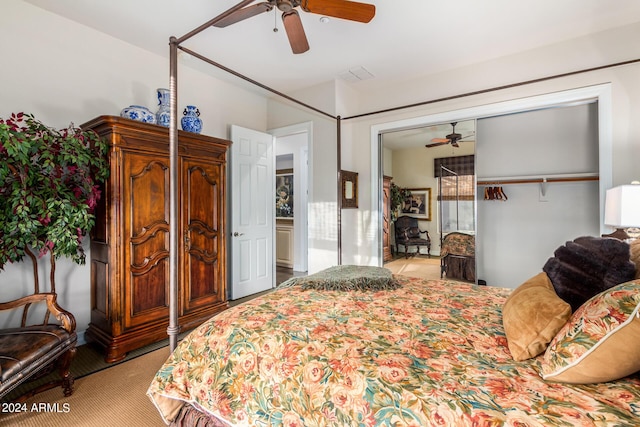 carpeted bedroom with a closet and ceiling fan