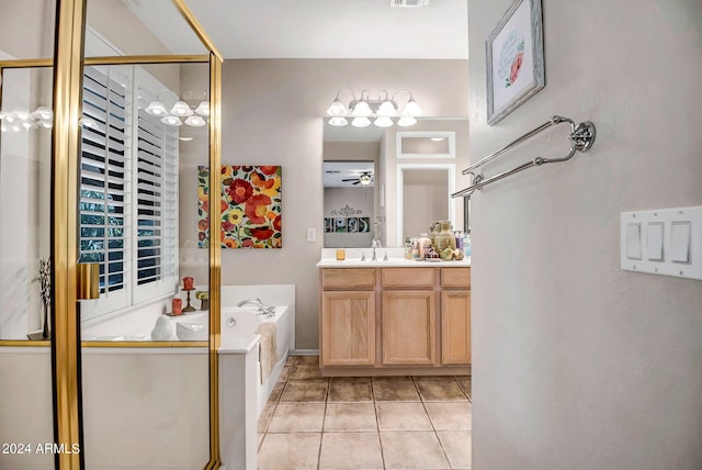 bathroom featuring tile patterned flooring, vanity, ceiling fan, and plus walk in shower