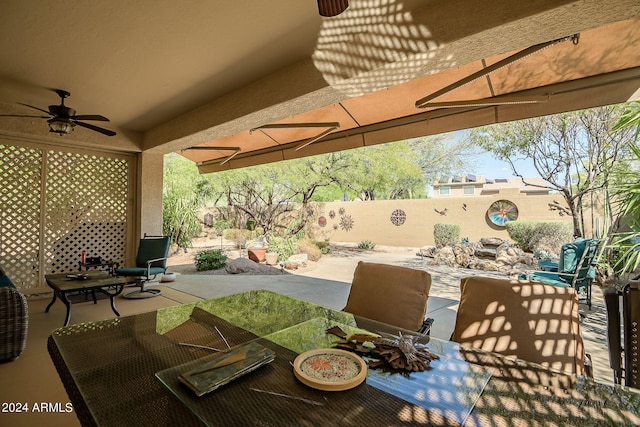 view of patio with ceiling fan