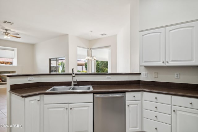 15016 W Monterey Way, Goodyear, AZ 85395 - kitchen featuring dark countertops, a sink, visible vents, and stainless steel dishwasher