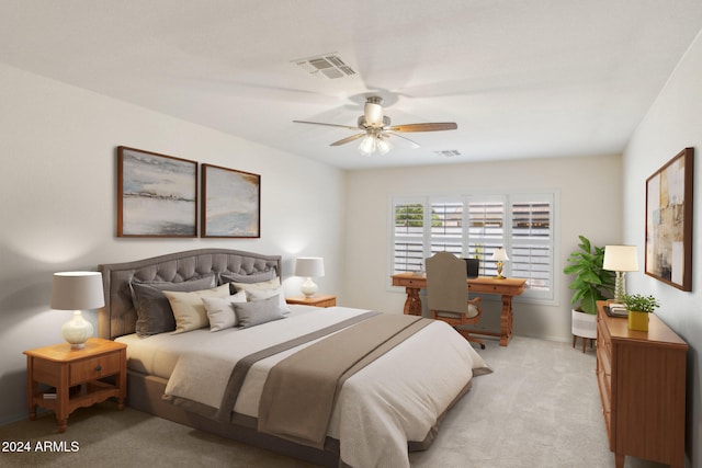 bedroom with ceiling fan and light carpet