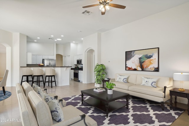 15016 W Monterey Way, Goodyear, AZ 85395 - living area with recessed lighting, ceiling fan, visible vents, arched walkways, and a high ceiling