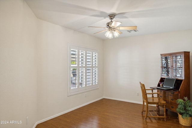 home office featuring hardwood / wood-style floors and ceiling fan