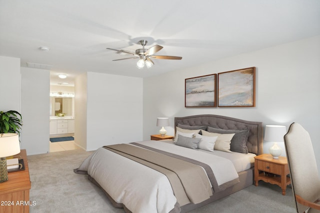 15016 W Monterey Way, Goodyear, AZ 85395 - carpeted bedroom with ensuite bath, a ceiling fan, and visible vents