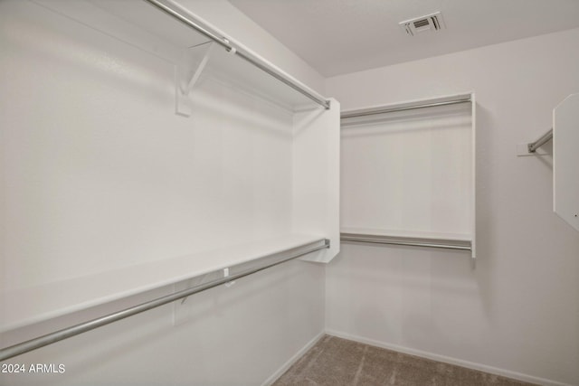 15016 W Monterey Way, Goodyear, AZ 85395 - walk in closet with carpet flooring and visible vents