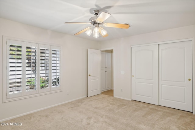 15016 W Monterey Way, Goodyear, AZ 85395 - unfurnished bedroom with ceiling fan, carpet floors, baseboards, and a closet