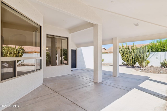 view of patio with a water view