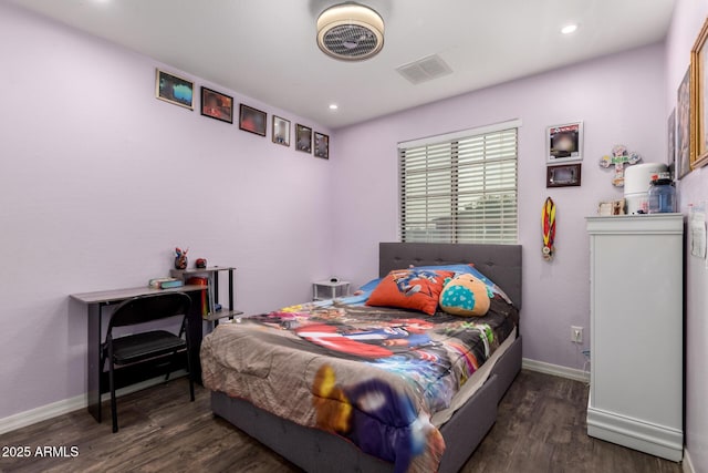 bedroom featuring dark hardwood / wood-style floors