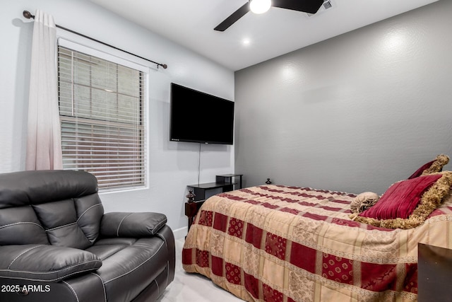 bedroom featuring ceiling fan