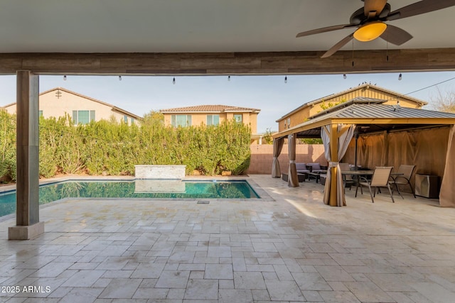 view of pool with a gazebo and a patio area