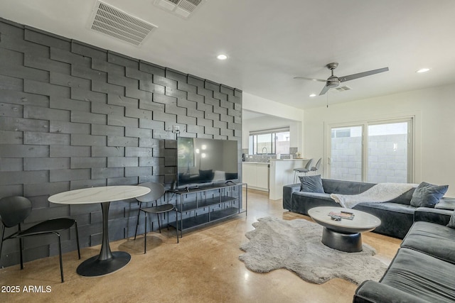 living room with ceiling fan