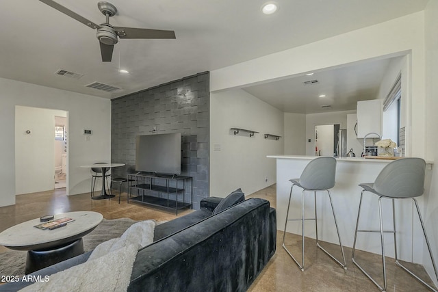 living room featuring ceiling fan