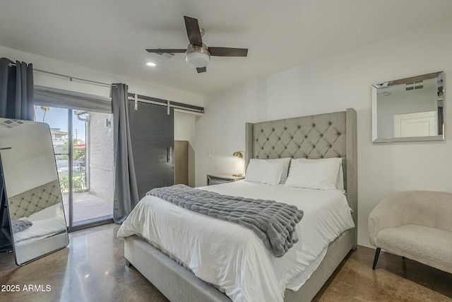 bedroom with access to outside, concrete flooring, a barn door, and ceiling fan