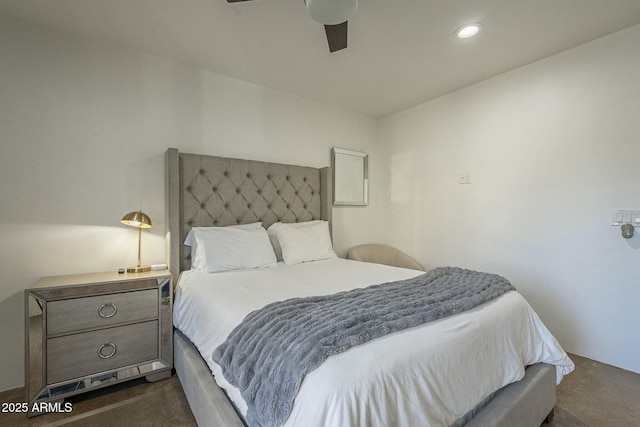 carpeted bedroom featuring ceiling fan