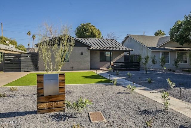 exterior space featuring a front lawn