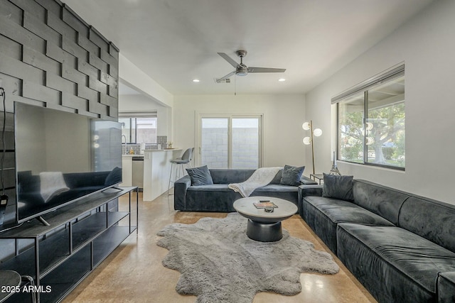 living room with ceiling fan