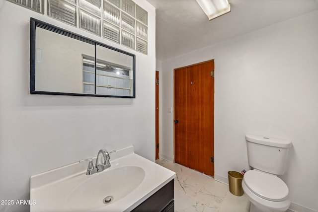 126 E Cattle Ln, Taylor, AZ 85939 - bathroom featuring marble look tiles and vanity