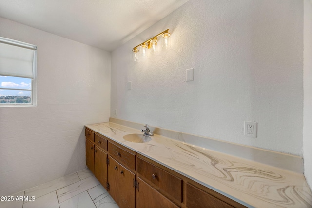 126 E Cattle Ln, Taylor, AZ 85939 - bathroom with vanity and marble look tile flooring