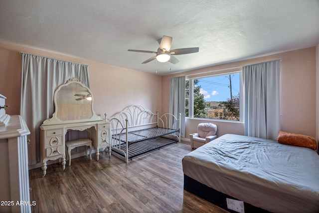 126 E Cattle Ln, Taylor, AZ 85939 - bedroom featuring wood finished floors, ceiling fan, and a textured ceiling