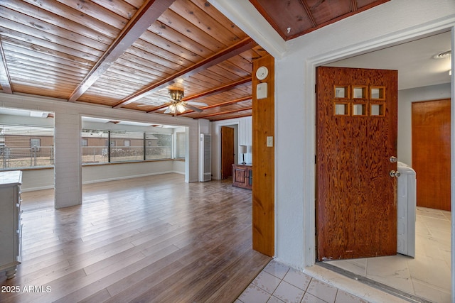 126 E Cattle Ln, Taylor, AZ 85939 - unfurnished room featuring a wooden ceiling with exposed beams, ornate columns, ceiling fan, and light wood-style floors