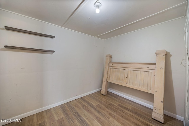 126 E Cattle Ln, Taylor, AZ 85939 - unfurnished bedroom with wood finished floors and baseboards