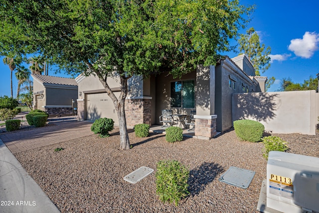 view of front of home with a garage