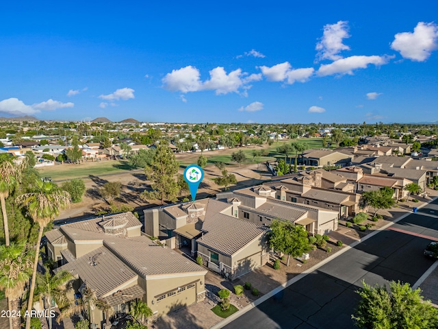 birds eye view of property with a residential view