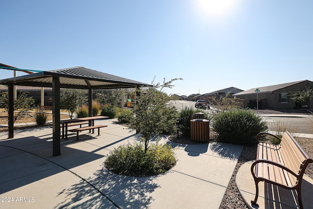 view of home's community with a gazebo and a patio